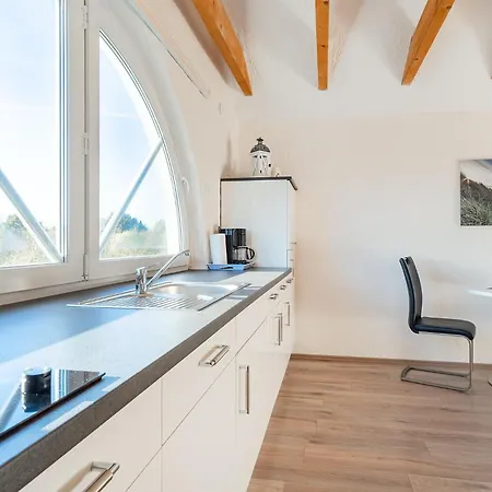 Seestern Mit Rundbogenfenster Am Badesee Tannenhausen Apartment Aurich